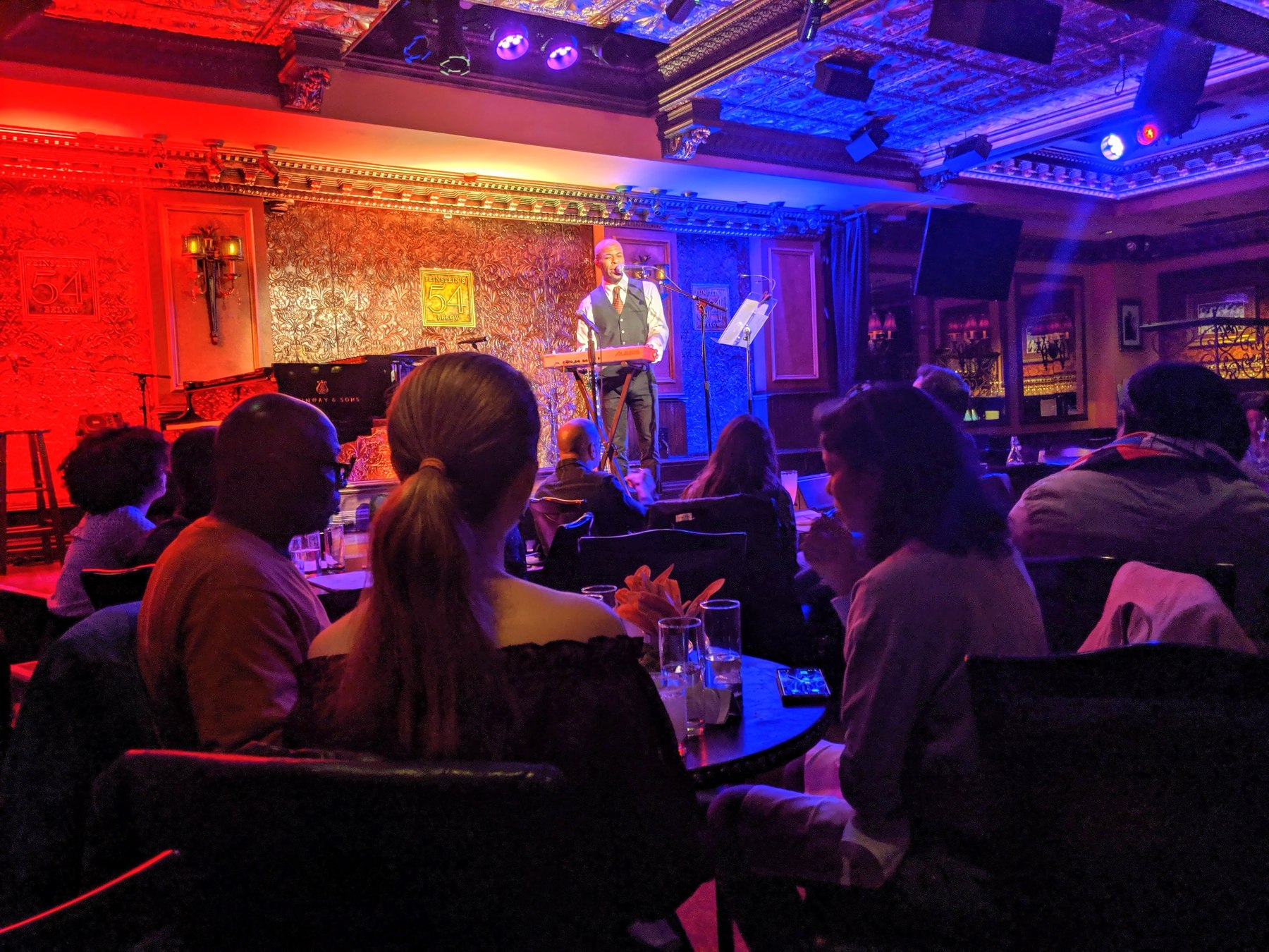 Interior of 54 Below in New York City in 2019, with an unrelated performer on stage