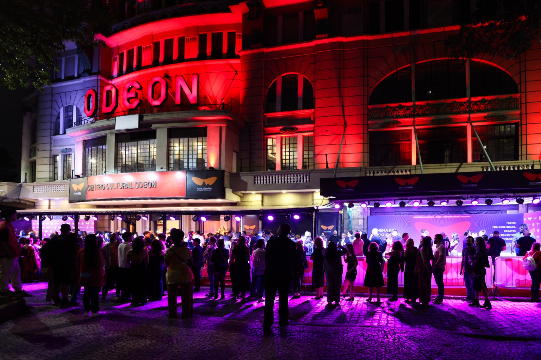Cine Odeon’s facade illuminated in red during the opening of Festival do Rio in October 2024.
